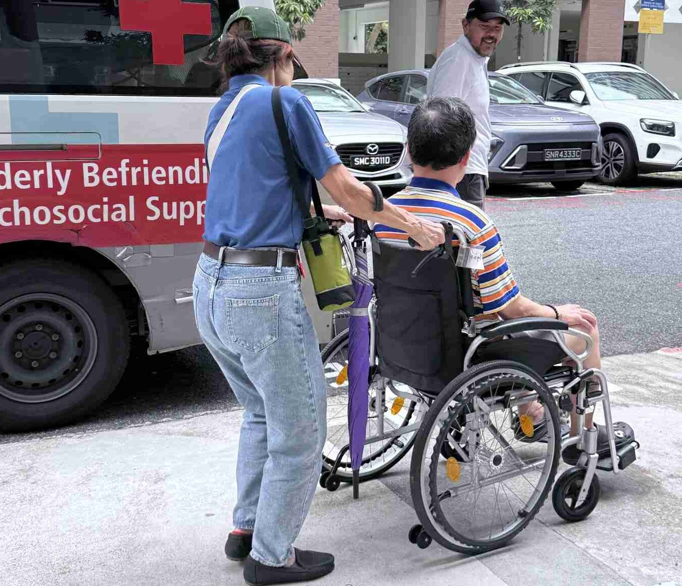 Chaperone and driver helping the client to vehicle