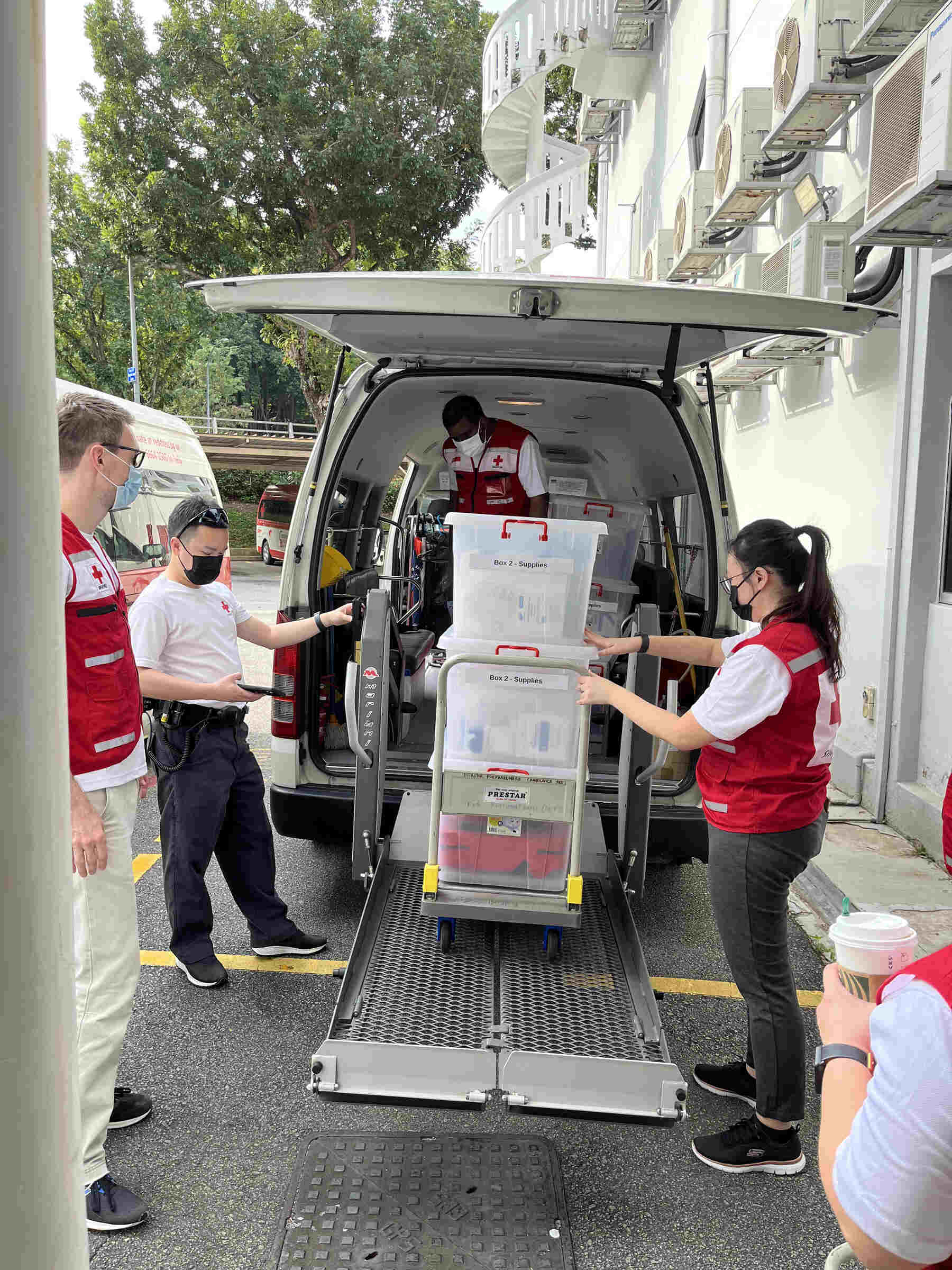 Singapore Red Cross volunteer overlooking the audience at Singapore’s NDP 2025